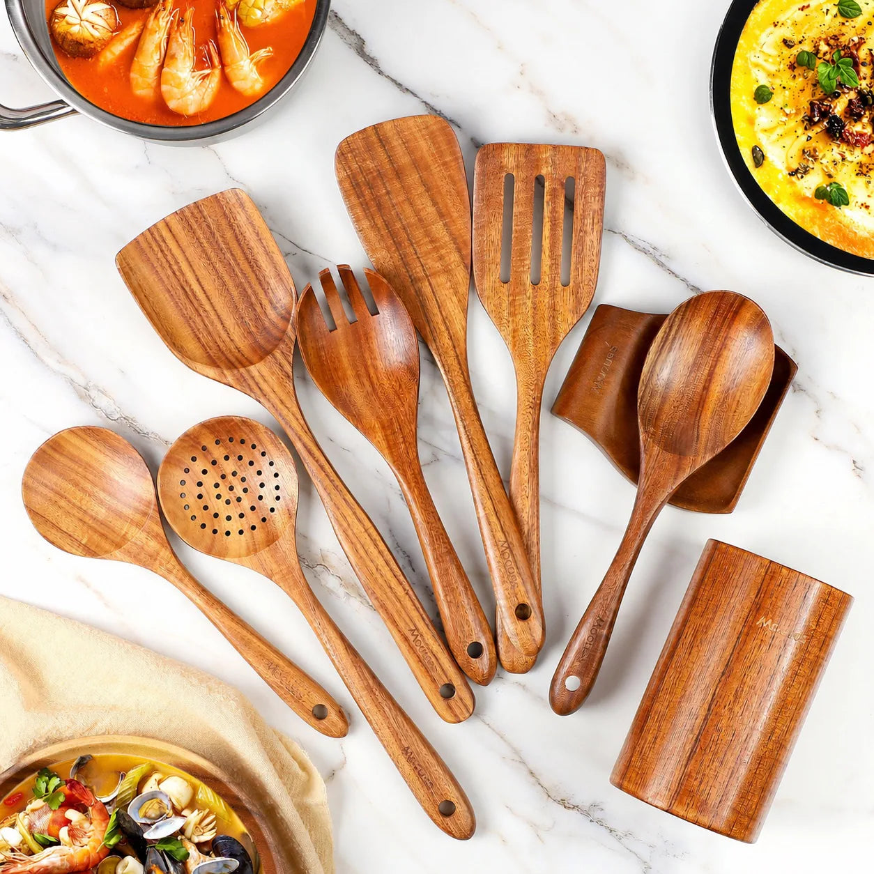 All nine pieces in the Mooues flagship teak set