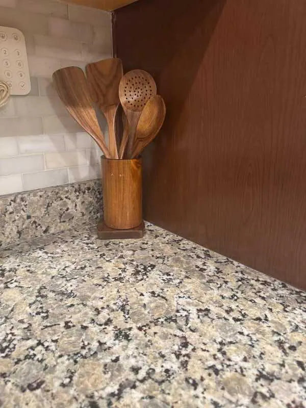 Customer photo showing Mooues teak utensils in a kitchen