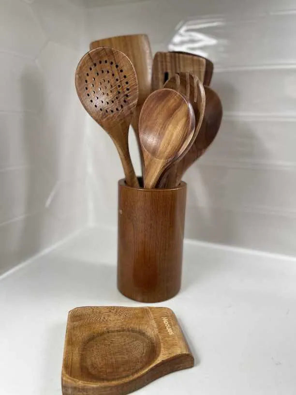 Customer photo of the Mooues teak utensil set and spoon rest on a white counter